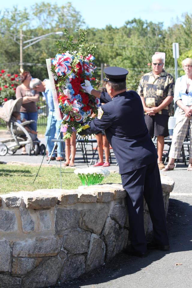 Flower placed for Peter Simpson by John Ficker.

Memorial Service NFD. September 9, 2012. Photo by Vincent P. Tuzzolino